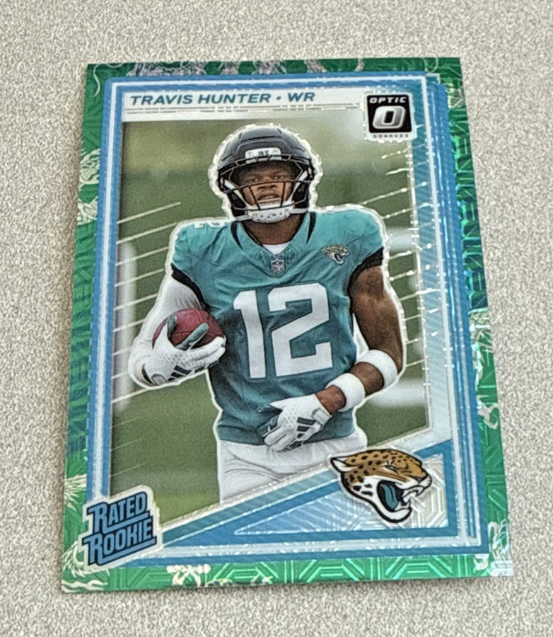 2025 Panini Donruss Optic Rated Rookie Dragon Prizm #201 Travis Hunter 4/24