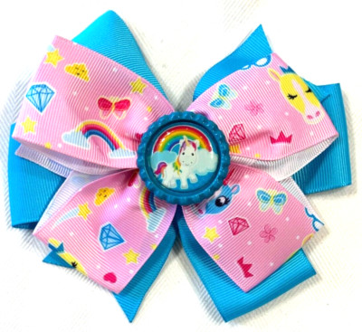 Beautiful Unicorn under a Rainbow Inspired hair bow for girls.