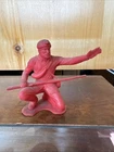 vintage red plastic toy, often attributed to Marx toys from the 1960s or 1970s