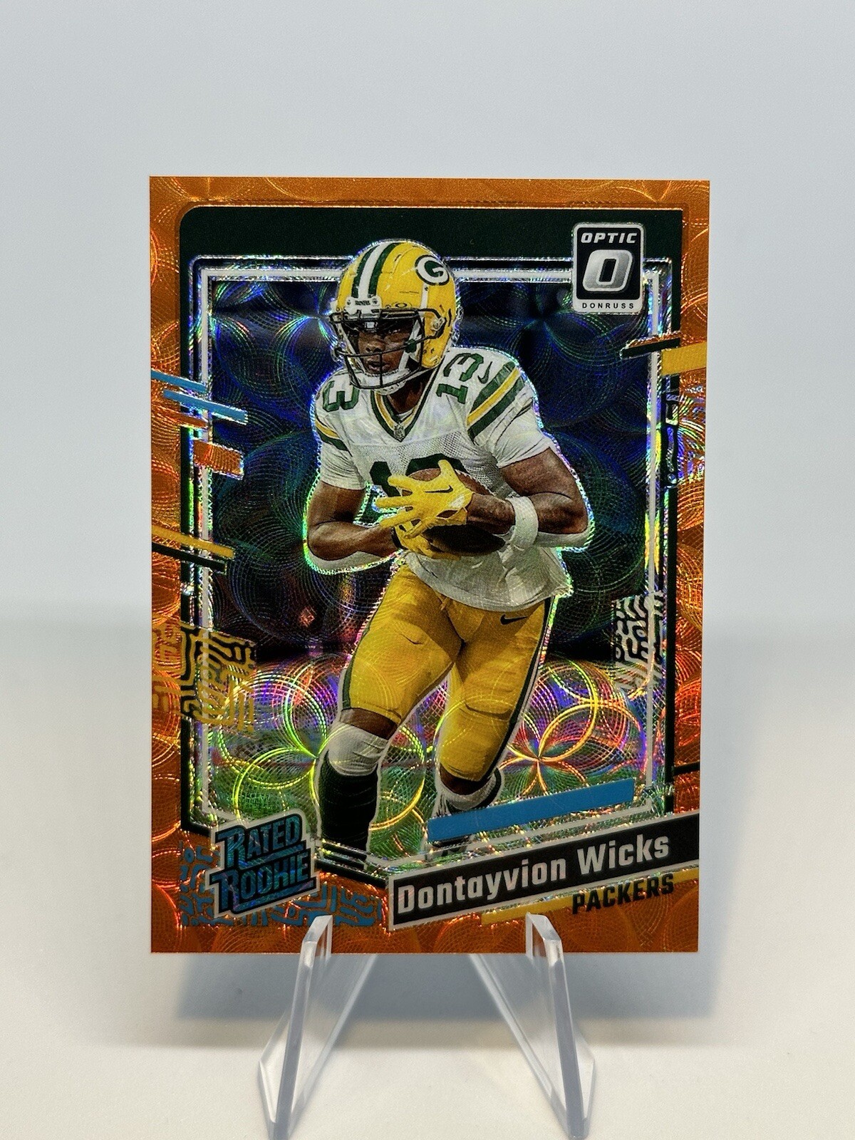 2023 Donruss Optic Dontayvion Wicks Orange Scope Prizm /79 Packers #249