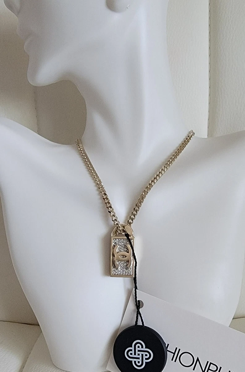 Authentic 2021 CHANEL Crystal Dog Tag Charm Necklace Gold Unisex