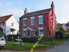 Photo 12x8 Pudding Gate, Bishop Burton, Yorkshire At the junction with Rat c2016