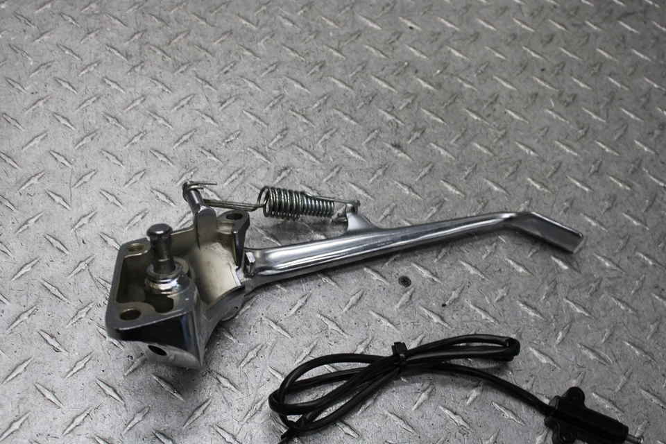 Suzuki Savage 650 1997 estribo izquierdo y soporte lateral montaje Foto 4 de 4