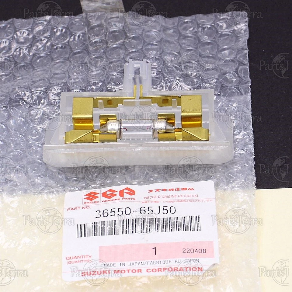 Lámpara de cortesía de puerta con conjunto de bombillas OEM Suzuki 2006-2010 Grand Vitara 36550-65J50 Foto 4 de 4