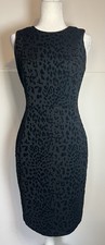 Calvin Klein black sheath dress size 8 sleeveless knee length animal print