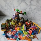 Vintage Lot of Teenage Mutant Ninja Turtles Figures, Vehicles, Weapons and Acc.
