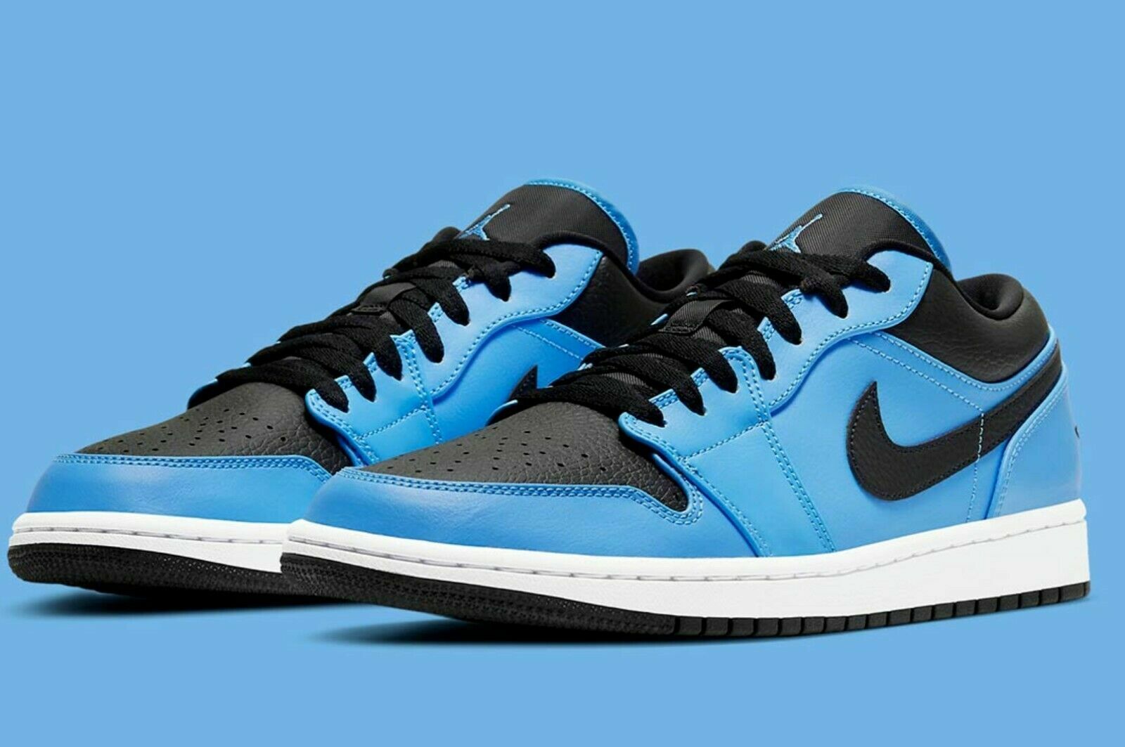 black and blue low top jordans