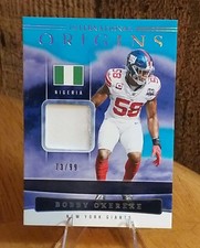 2025 Panini Origins Bobby Okereke International Origins Blue 73/99 #IO-BOE
