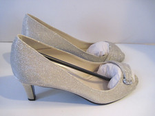 CAPARROS Silver Metallic Heels Pumps Designer Front Rhinestone Buckle 10 B, NEW
