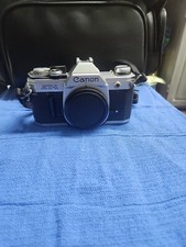 CANON AT-1 SLR 35mm Film Camera with Zoom Lens; Vintage; With Bags And Extras