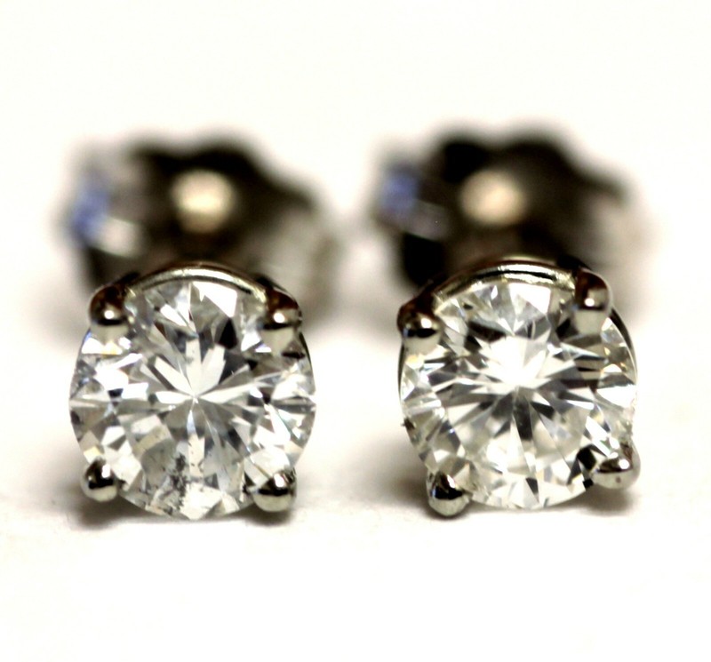 GIA certified 10k white gold .62ct I1 H-I round diamond 4 prong stud earrings