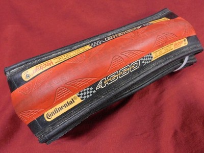 1  Continental Grand Prix 4000 Black / Red 700C x 23 mm Folding Tire & PV Tube