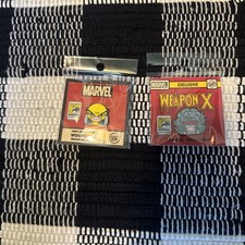 SDCC 2026 Exclusive 100% Soft Marvel Exclusive Weapon X  and Wolverine Pin