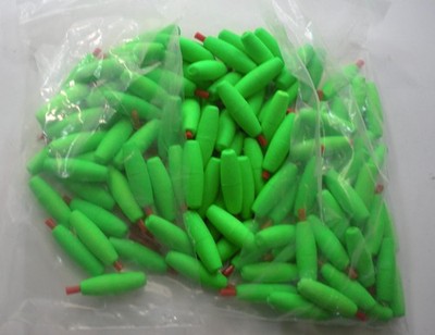 Comal C150-G-100 1-1/2'' x 1/2'' Green Torpedo Float W/Pegs Inserted Bag of 100