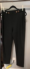Women s Black dress pants size Large with pockets front and back