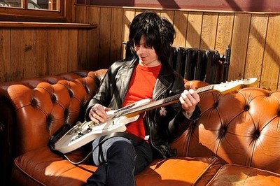 Portrait of musician Barrie Cadogan with his custom electric Phill- Old Photo 2