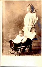 Antique RPPC Real  Photo Postcard Girl Baby in Carriage ID'd Lucille Hunter Ken