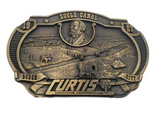 VINTAGE COVERED WAGON BELT BUCKLE CURTIS MACHINE CO DODGE CITY