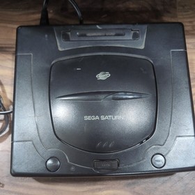 SEGA Saturn Console MK-80000A Black with 4 games. no video cord or controllers
