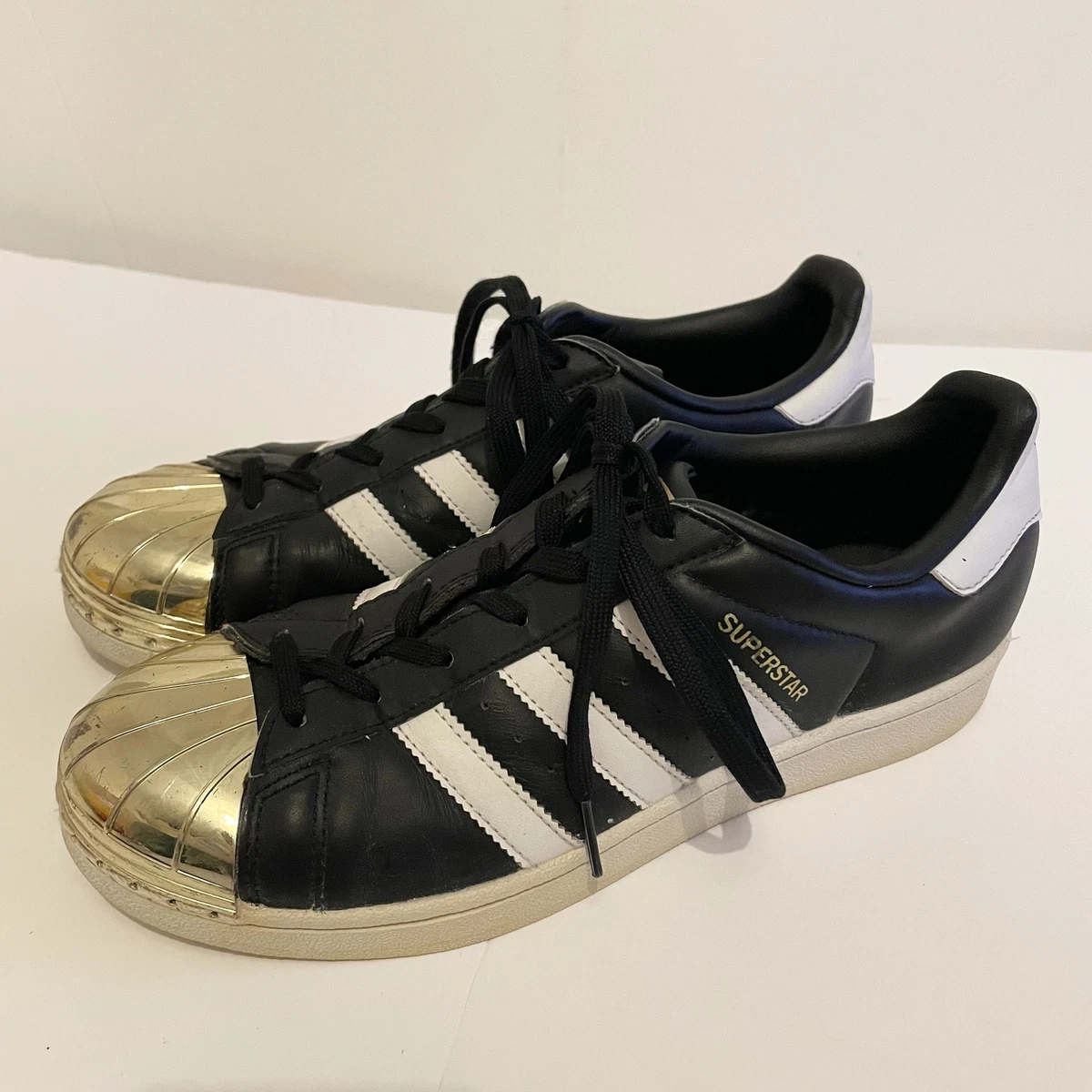 Superstar black and gold clearance toe