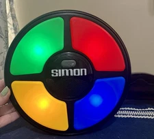 Hasbro 2015 Simon Says Handheld Electronic Memory Game Light Up Tested & Working