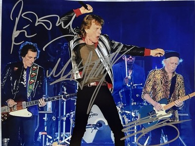 JAGGER , RICHARDS and WOOD  of THE ROLLING STONES Hand signed 8X10 photo w COA.