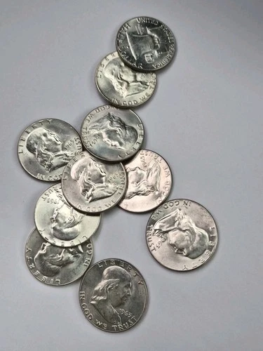 10) 1963 Franklin Half Dollar Lot. Choice Brilliant Unc. 90% Silver