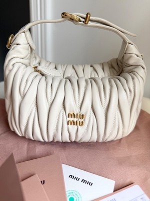 Miu Miu Arcade Matelassé, cream color. Includes additional strap