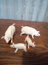 Vintage Farm Figure Pigs - Collectible 4 Pieces