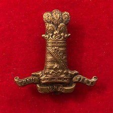 11th Hussars (Prince Albert's Own) cap badge.