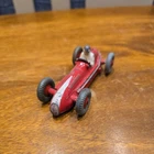 Vintage Dinky 231 Maserati Racing Car with driver.  Red body. White flash. RN 9.