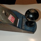 Blue Blackhawk C557MP wood hand plane with silver handle, made in USA, and visible Blackhawk “CT 910” branding.