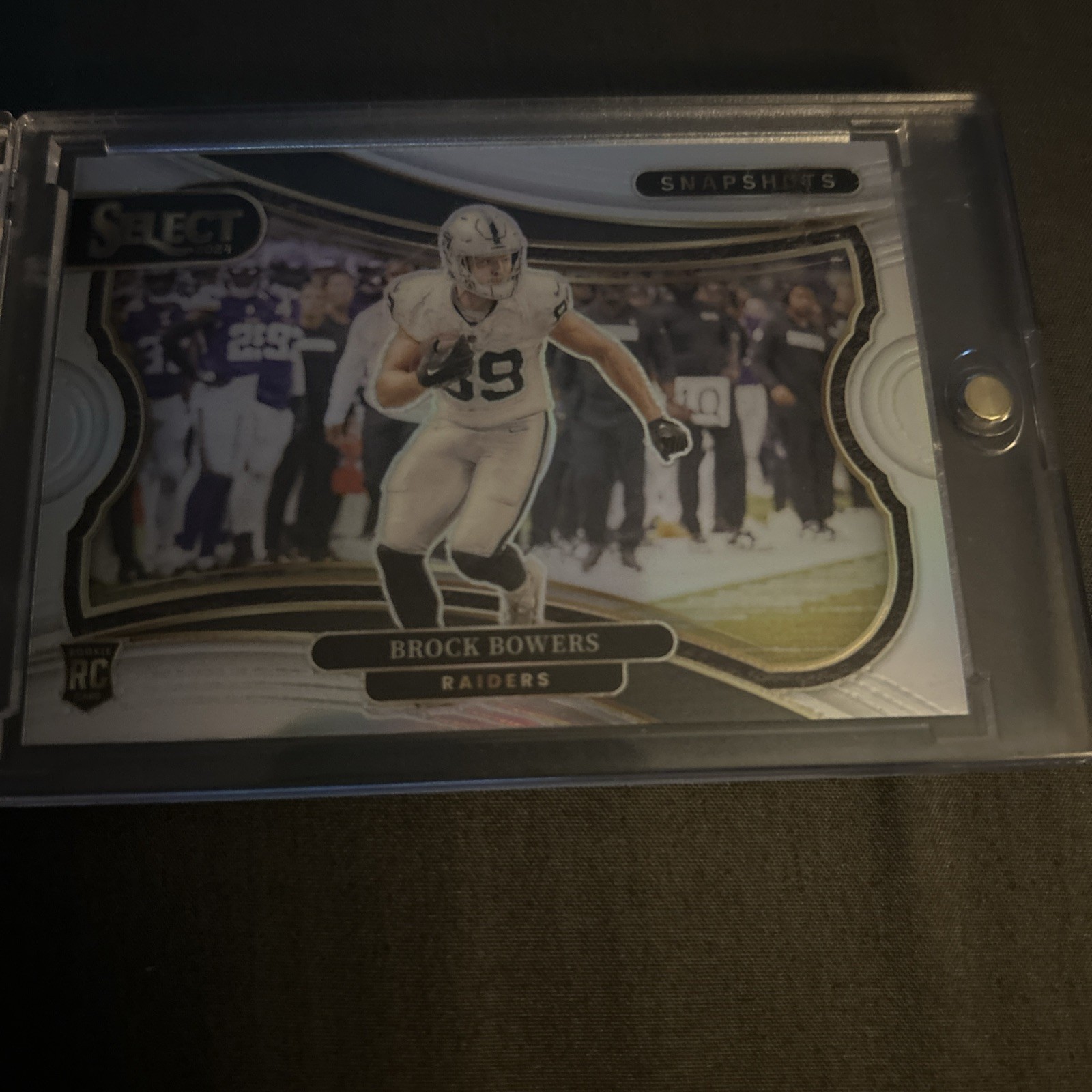2024 Panini Select - Snapshots Brock Bowers #20 Silver Prizm (RC)