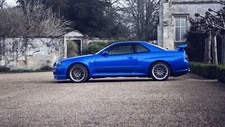 Cars parking rims blue nissan skyline gt r Desk Mat Stitched