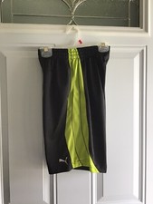 Puma Sports Life Style Youth Boy S. Athletic Black/Florescent Green Shorts.