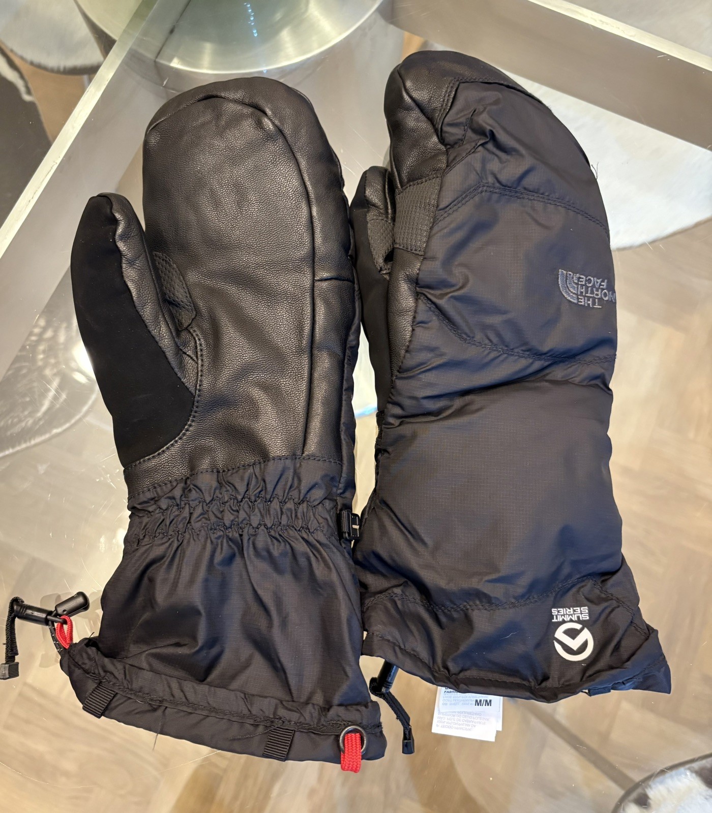 Guantes/mitones The North Face Summit Series. Relleno de plumón de ganso. Empuñadura de piel de cabra