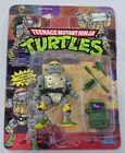 S-397 VINTAGE 1980'S TEENAGE MUTANT NINJA TURTLES METAL HEAD MINT ON CARD