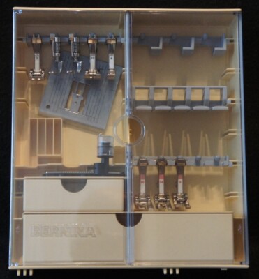 Bernina Accessories Case w/9 feet and a stitch plate in Very Good Condition !