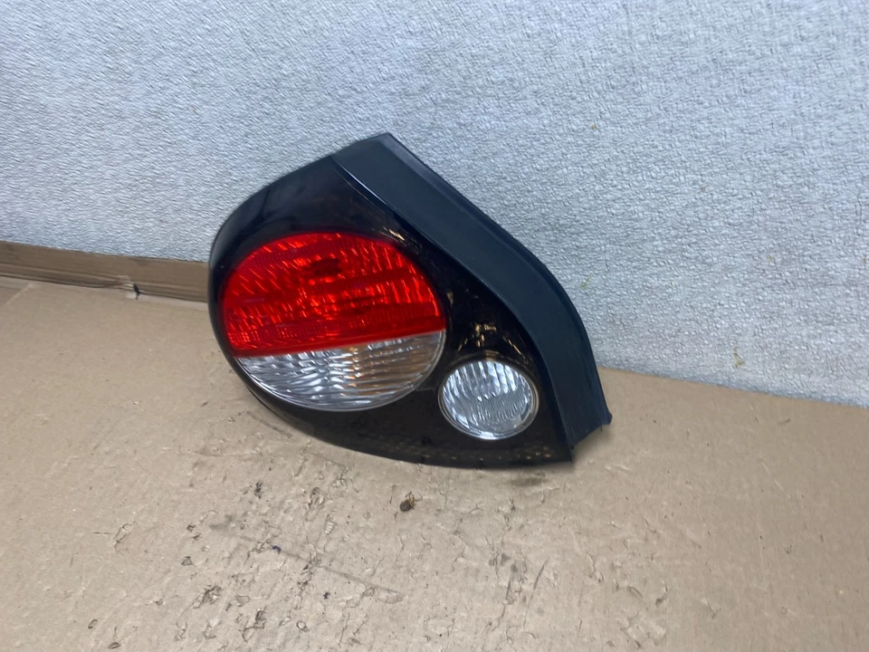 Luz trasera izquierda conductor Nissan Máxima 2000 a 2001 OEM U1283 DW Foto 2 de 4