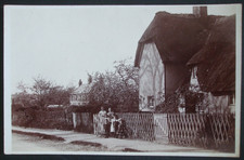Old Cambridgeshire RPPC FAMILY OUTSIDE THATCHED COTTAGE BOURN Real Photo Cambs