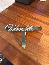Vintage Oldsmobile Script Emblem Badge