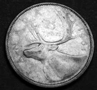 1961 25¢ silver coin that shows details - great investment in silver