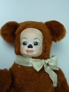 teddy bear with porcelain face
