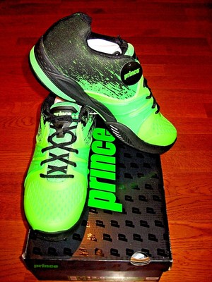 green and black tennis shoes