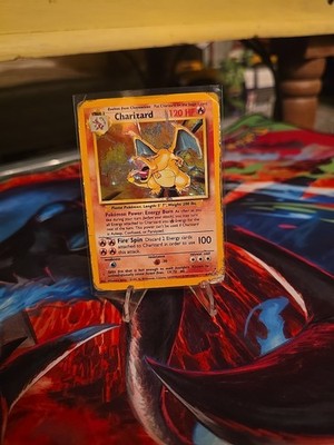 Charizard #4 from Base Set ((1999)) – Pokémon card