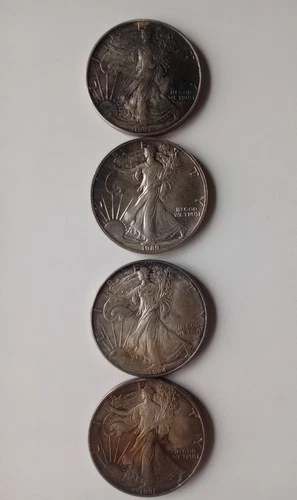 New ListingSet of 4 American Silver Eagle 1 Dollar/ 1oz Fine Silver.  Beautifully Toned.