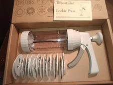 The Pampered Chef 1525 Cookie Press with 16 Discs - White