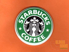 One 2.25" round Starbucks fridge/locker magnet coffee java