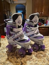 Roller skates byKUXUAN sports fit size 9 to 12 kids.