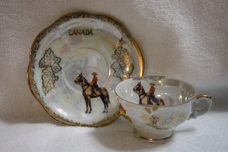 Iridescent Truro Canada Miniature Teacup and Saucer